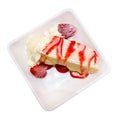 Top view of Slice of cheesecake layer on the white plate, focus selective Royalty Free Stock Photo