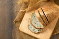 Top view of sliced french grain breads with white and black sesame