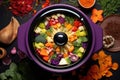 top view of a slow cooker with a colorful dish inside