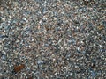 Top view of small and large stones on the ground Royalty Free Stock Photo