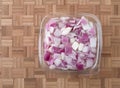 Chopped red onions in a plastic container Royalty Free Stock Photo