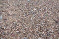 Top view of a small stone surface on a sandy beach is the background Royalty Free Stock Photo
