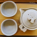 Top view of a small tea sets for sale with tea ceremony board on tourist market. Food theme Royalty Free Stock Photo