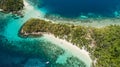 Top view of small tropical island in the Philippines. Island hopping tour in Port Barton Royalty Free Stock Photo