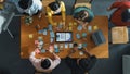 Top view of developer team working together to stick idea on board. Convocation.