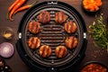 top view of smart grill with bbq sauce and spices