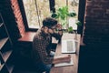 Top view of smart guy working on laptop and making notes Royalty Free Stock Photo