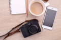 Top view smartphone mockup with coffee, digital camera and note