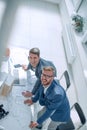 Top view. smiling fellow architects looking at the camera Royalty Free Stock Photo