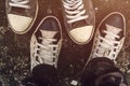 Top view of sneakers from above on asphalt road Royalty Free Stock Photo