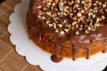 Top view of Snickers cake decorated with peanuts