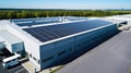 Top view Solar Cell on Warehouse Factory. Solor photo voltaic panels system power or Solar Cell on industrial building roof for