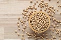 Top view of Soybeans in a bowl on wooder background, Healthy eating concept Royalty Free Stock Photo