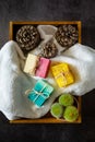 Top view of spa box with organic handmade soap bars with dark background