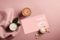 Top view of Spa service gift card on soft pink background. Spa still life concept Royalty Free Stock Photo