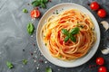 Top view of Spaghetti Bolognese in a white plate on black slate background with copy space. Italian pasta with minced Royalty Free Stock Photo