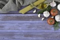 Top view of spaghetti pasta and ingredients on wooden tabletop Royalty Free Stock Photo