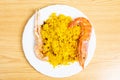Top view of the Spanish seafood rice with prawns and crayfish on a plate Royalty Free Stock Photo