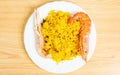 Top view of the Spanish seafood rice with prawns and crayfish on a plate Royalty Free Stock Photo
