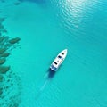 Top view on speed boat in paradise turquoise ocean