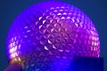 Top view of sphere Spaceship Earth attraction on blue night background at Epcot in Walt Disney World.