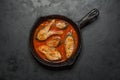 Top view of spicy and hot Bengali fish curry. Indian food. Fish curry with red chili, curry leaf, coconut milk. Asian cuisine. Royalty Free Stock Photo