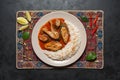 Top view of spicy and hot Bengali fish curry. Indian food. Fish curry with red chili, curry leaf, coconut milk. Asian cuisine. Royalty Free Stock Photo