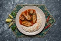 Top view of spicy and hot Bengali fish curry. Indian food. Fish curry with red chili, curry leaf, coconut milk. Asian cuisine. Royalty Free Stock Photo