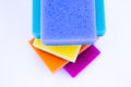 Top view of sponges for washing dishes, on a white background, isolated. Colorful multi-colored as rainbow sponges lay one each Royalty Free Stock Photo