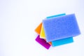 Top view of sponges for washing dishes, on a white background, isolated. Colorful multi-colored as rainbow sponges lay one each Royalty Free Stock Photo