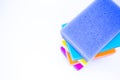 Top view of sponges for washing dishes, on a white background, isolated. Colorful multi-colored as rainbow sponges lay one each Royalty Free Stock Photo