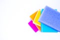 Top view of sponges for washing dishes, on a white background, isolated. Colorful multi-colored as rainbow sponges lay one each Royalty Free Stock Photo