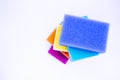 Top view of sponges for washing dishes, on a white background, isolated. Colorful multi-colored as rainbow sponges lay one each Royalty Free Stock Photo