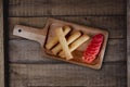 Top view of spring rolls on rustic wooden background Royalty Free Stock Photo