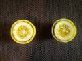 Top view squeezed lemon fruits on a black surface Royalty Free Stock Photo
