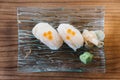 Top view of Squid sushi topping with salmon caviar served with wasabi and pickled ginger Royalty Free Stock Photo