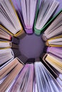 top view of stack of colored books in circle