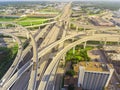 Top view stack interchange expressway and Houston skyline background