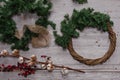 Top view of stages of making Christmas wreath, toned