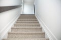 Top view of Staircase in the modern house with brown carpet, walk through ground floor Royalty Free Stock Photo