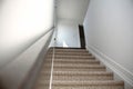 Top view of Staircase in the modern house with brown carpet, walk through ground floor Royalty Free Stock Photo