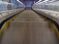 Top view, stairs and escalator in modern building for travel, moving and transport in airport. Metal, steel and closeup Royalty Free Stock Photo