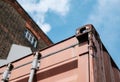 Top view of a standard metal Shipping Container showing rust and flaky paintwork. Royalty Free Stock Photo