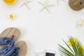 Top view starfish and shells, oranges and coconut, palm and sunglasses summer beach concept. Flat lay with copy space Royalty Free Stock Photo