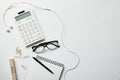 Top view of stationery, calculator, earphones Royalty Free Stock Photo