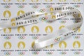 top view strap and labels printed with Paris Olympic Games 2024 logo horizontal composition