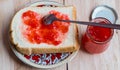 Top view strawberry jam with bread; fruit jam