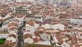 Top view of the streets with white houses and orange tiled roofs, an ancient portuguese city on the ocean Royalty Free Stock Photo