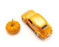 Top view studio shot small orange toy car with mini pumpkin isolated on white Royalty Free Stock Photo