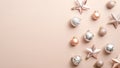 Top view stylish Christmas decorations on ivory background. Flat lay silver and pink Xmas balls and stars. Winter holiday postcard Royalty Free Stock Photo